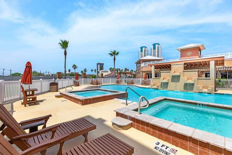 Catch the beautiful sunny south padre island climate poolside!