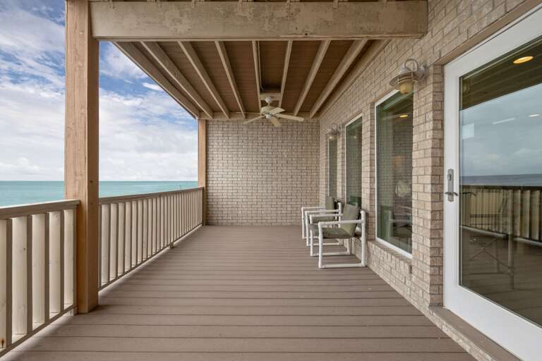 2nd-floor bayside balcony off the primary suite