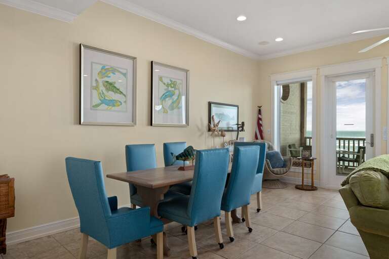 Ground-level dining area comfortably seats 6 guests