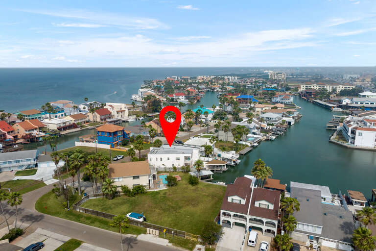 Aerial view of the property and channel leading to the Laguna Madre Bay