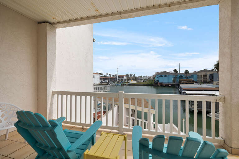 Balcony area overlooking the pool and channel front!