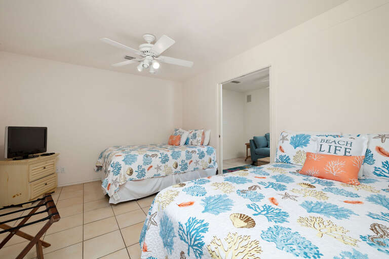 Ground Floor Guest Bedroom features 2 Queen beds