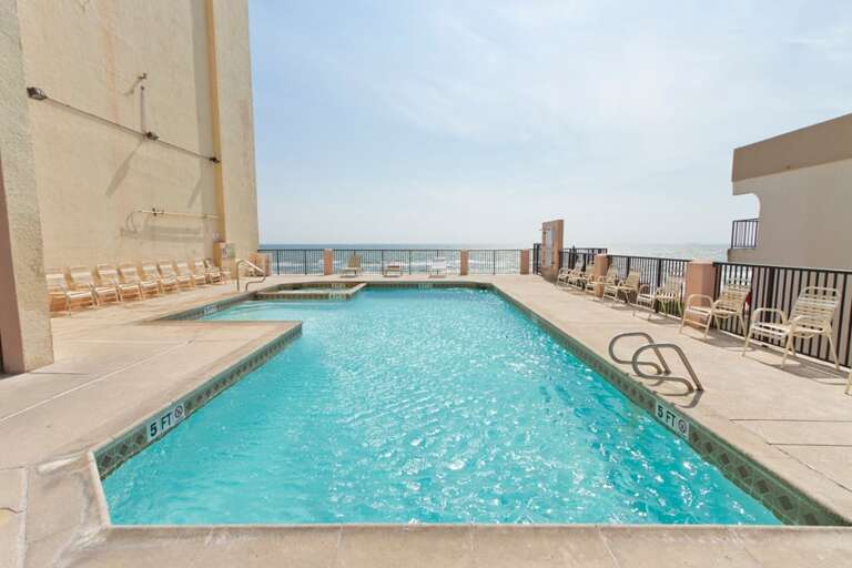 Spend sunny afternoons relaxing by the beachfront pool.