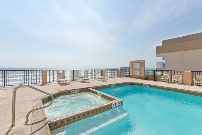 Unwind in the hot tub or soak up the sun overlooking the beach.