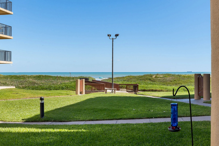 The beach access is just to the right of your patio, making every beach day effortless.