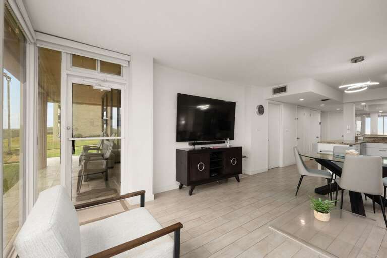 Interior Living Space With Furniture And Television