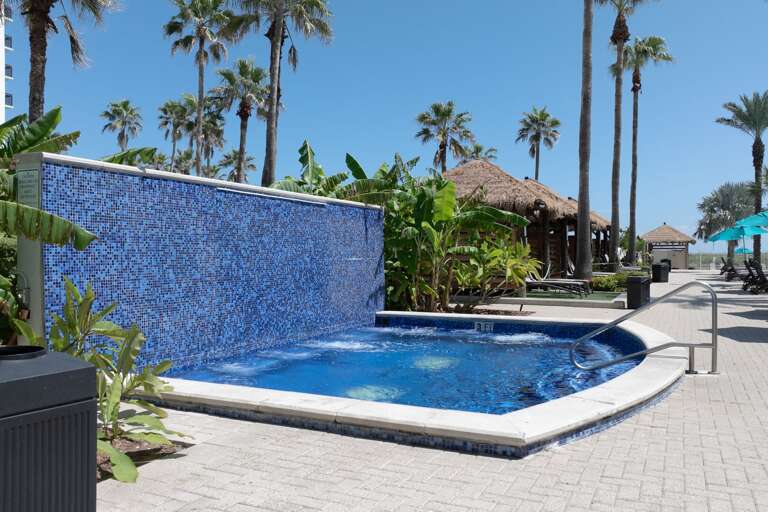 Heated resort hot tub perfect for evening relaxation under the stars.