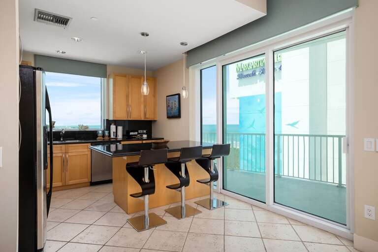 Kitchen allows extra seating for up to 3 guests