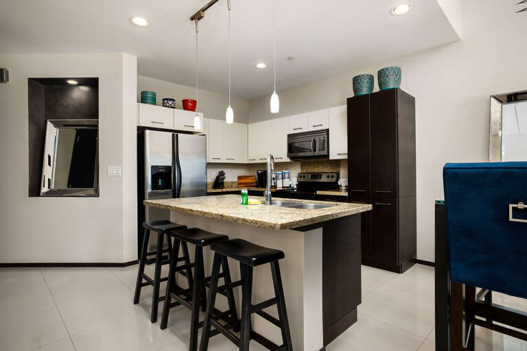 Kitchen Area fully equipped with essentials to prepare your favorite home cooked meal