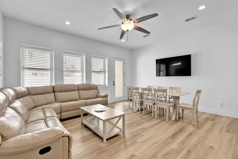 Ample seating surrounding a flat screen TV