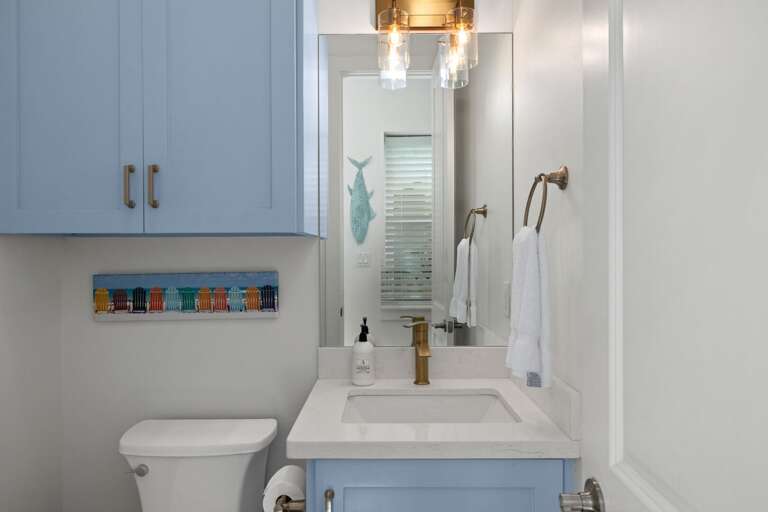A convenient half bath on the ground level adds extra comfort for everyone in your group.