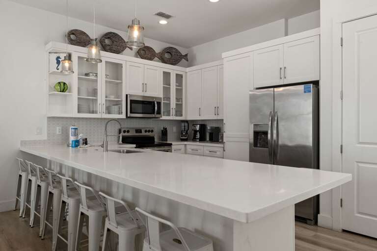 Enjoy a bright, welcoming kitchen designed to make preparing meals and gathering together easy.