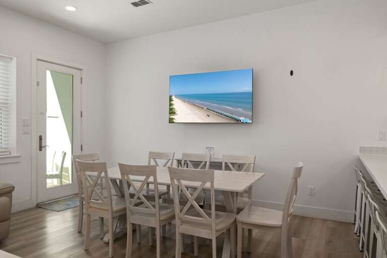 Enjoy family dinners, game nights, or morning coffee together in the bright dining space.