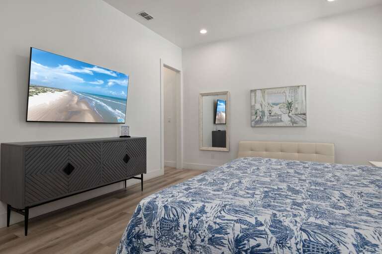 Kick back with your favorite movie on the large flat-screen TV from the comfort of the king bed.