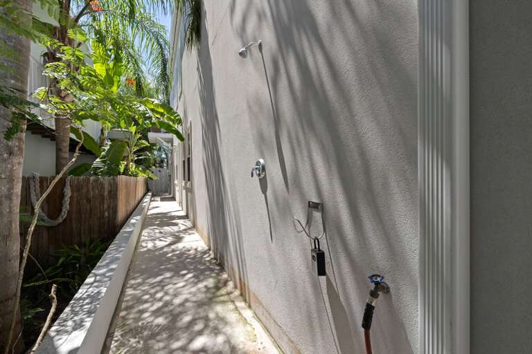 Outdoor shower makes washing off after the beach hassle free.