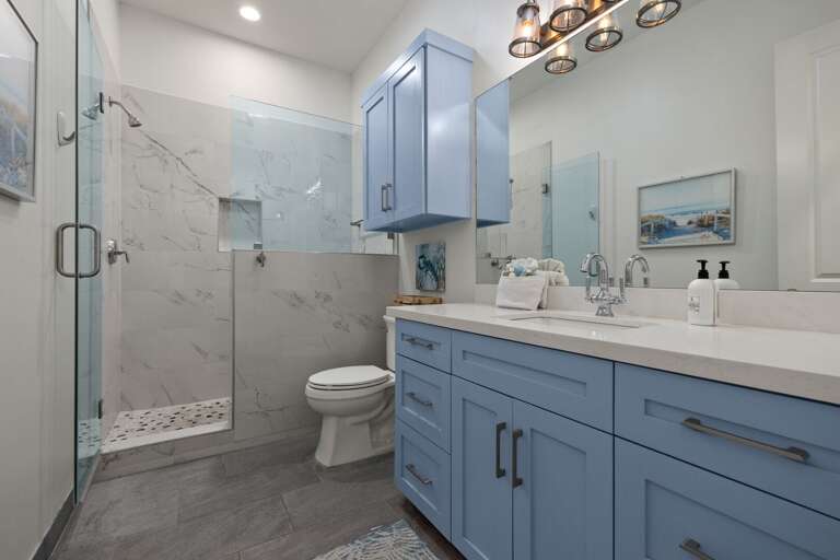 The primary ensuite features a beautiful walk-in tile shower and modern finishes to make getting ready a breeze.