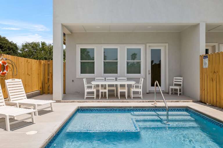 Ample seating in shaded patio area to enjoy the island climate