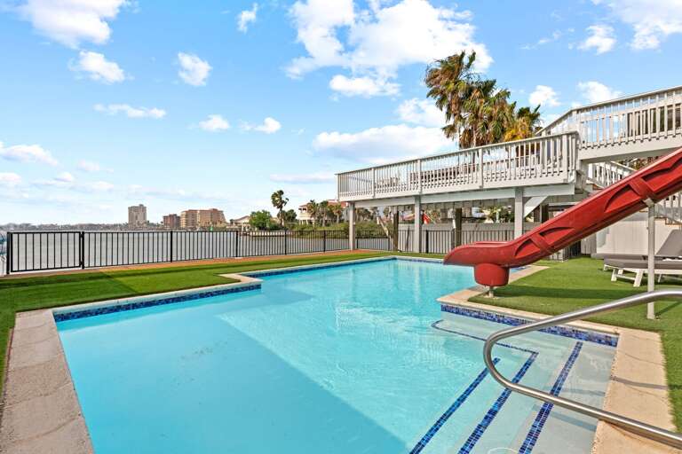 Swimming Pool With Slide At Vacation Rental Property