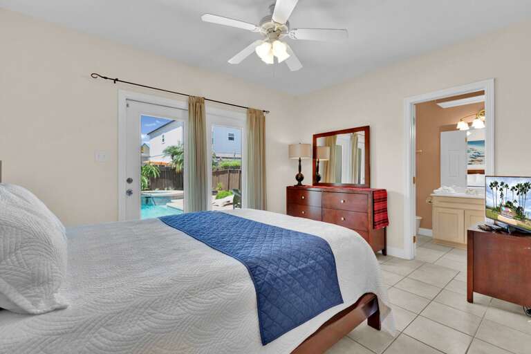 2nd bedroom provides access to the patio and pool area.