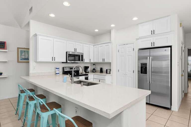 Kitchen is fully stocked with the pots, pans, and dishware you'll need to prepare home cooked meals.