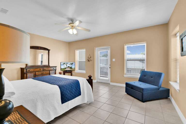 Master Bedroom features a Full size bed and private balcony.