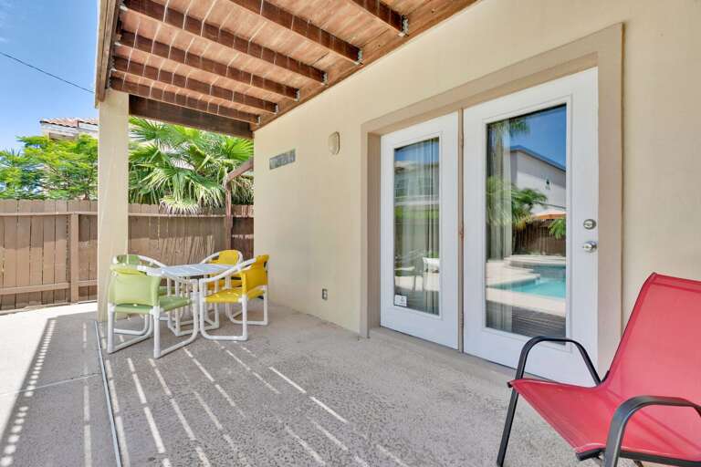 Shaded patio area to enjoy the beautiful island climate by the pool!