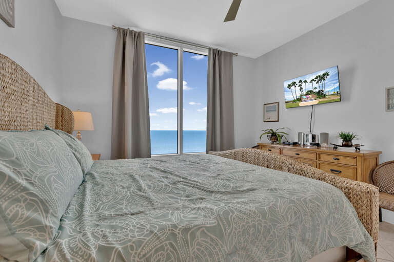 Master bedroom features a King Bed with spectacular views towards the beach