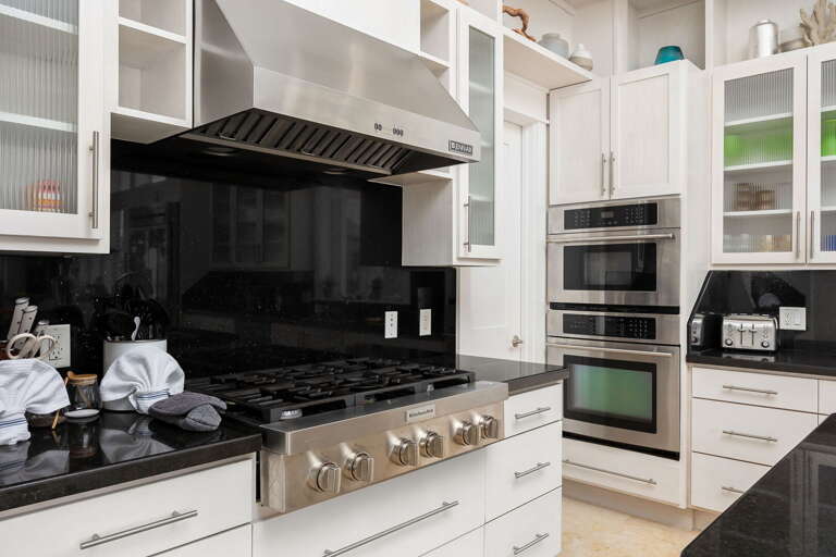 Fully stocked with pots, pans, and cookware to prepare a home cooked meal