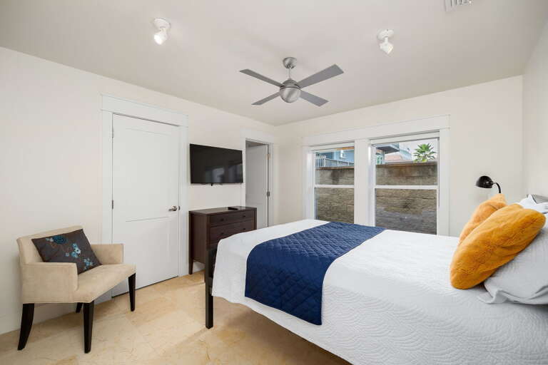 Ground Floor Guest Bedroom equipped with a Queen Bed