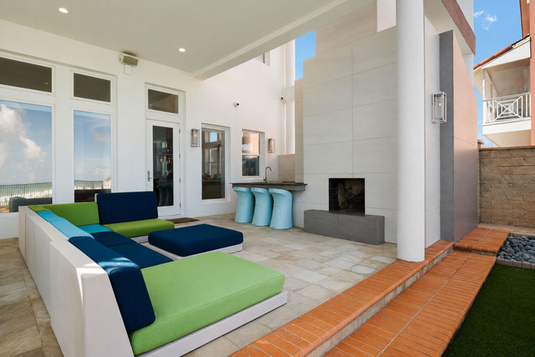 Plenty of space for entertaining and gathering with family and friends on the large beachside patio.