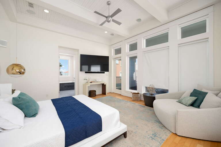 Spacious Master Bedroom! Equipped with Large Flat Screen TV & Direct Balcony Access