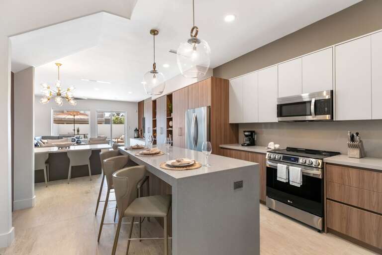 Residential Kitchen Interior With Island And Dining Area