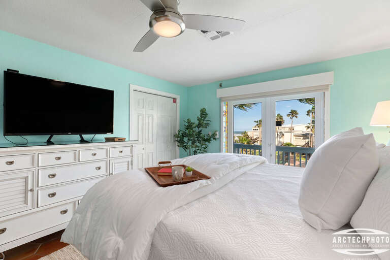 Interior Of A Bedroom With TV And View To The Outside
