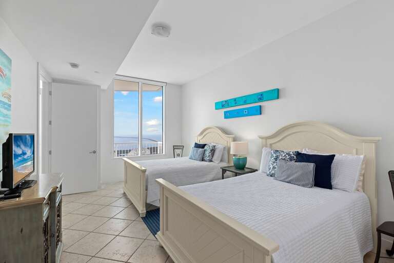 Guest bedroom with views to the bay area! Featuring 2 full size beds
