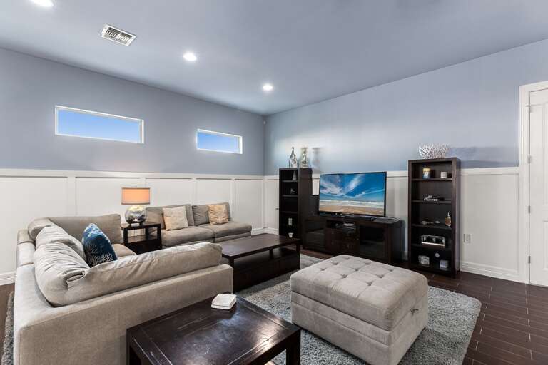 Ample seating surrounding TV for a perfect family night