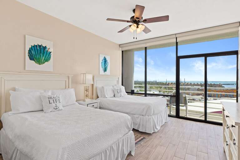 Guest Bedroom featuring 2 Full beds with views to the Laguna Madre!