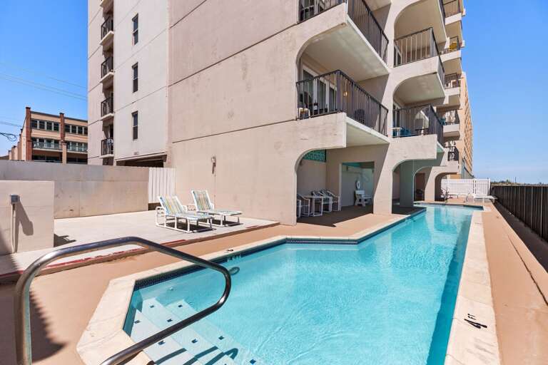 Large Sparkling Community Pool facing the beach