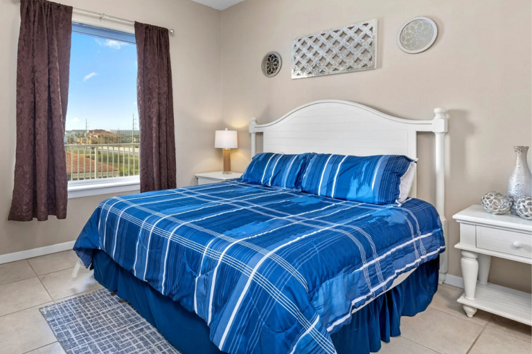 Recharge in the comfortable primary bedroom with a king bed and private ensuite bathroom.