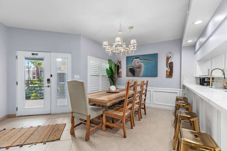 Dining Table comfortably sits up to 8 guests with extra seating at the kitchen bar! Dining Table comfortably sits up to 8 guests with extra seating at the kitchen bar!
