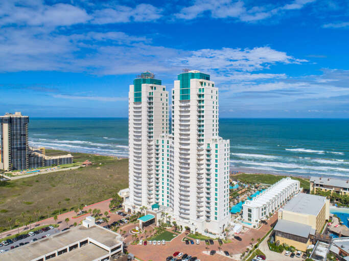 Aerial View Of High-rise Buildings Beside The Ocean
