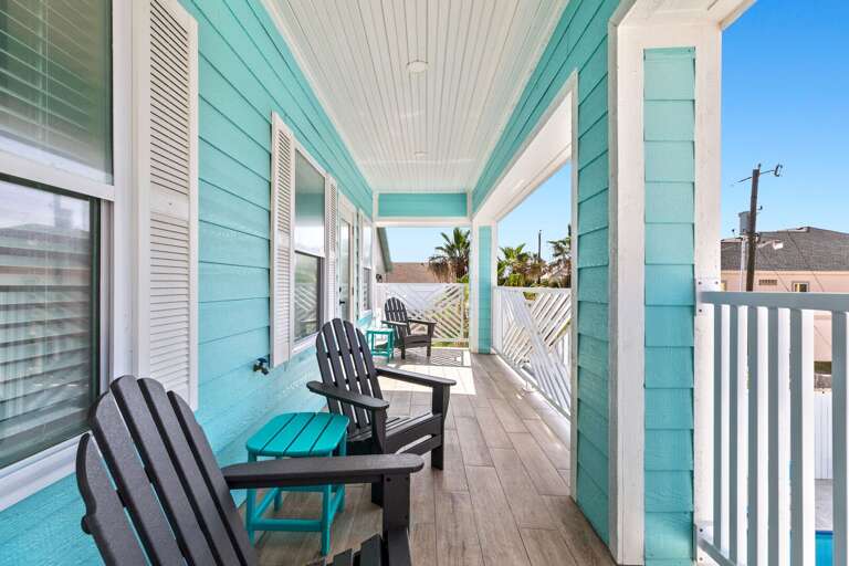 The second floor balcony is accessed from bedrooms 3 or 4, & is where you can catch a glimpse of the ocean!