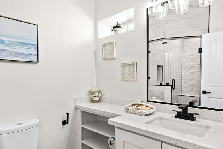 The private bathroom attached to the Master bedroom has a beautiful walk-in shower.