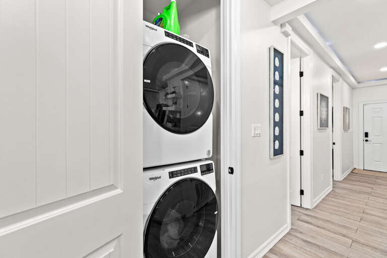 Washer & dryer are located on the ground floor in the laundry closet across from the kitchen.