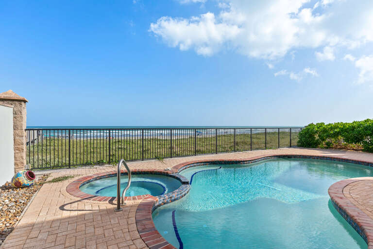 Beachfront elegance with private heated pool and hot tub!