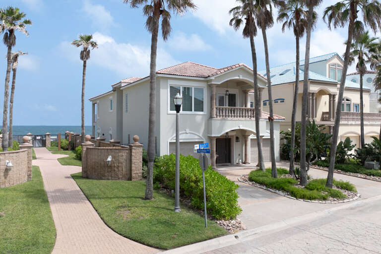 Front exterior right next to the community beach access