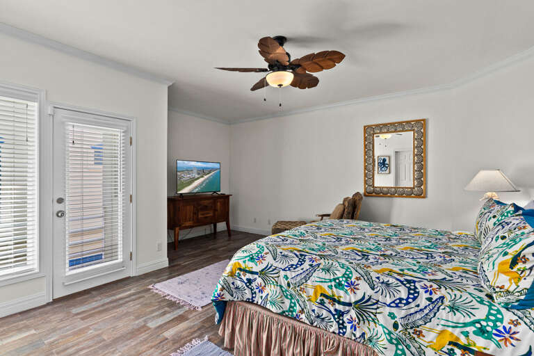 Guest Bedroom featuring King Bed and private balcony access.