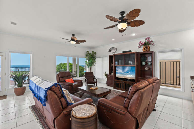 Large living room area with views towards the beach!