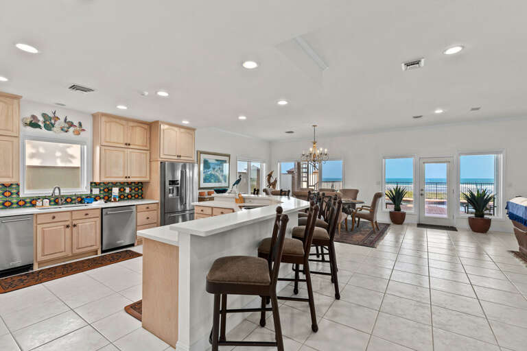 Large open-concept fully stocked Kitchen! Extra countertop seats available