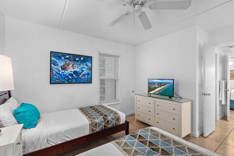 Flat Screen TV included in the twin bedroom