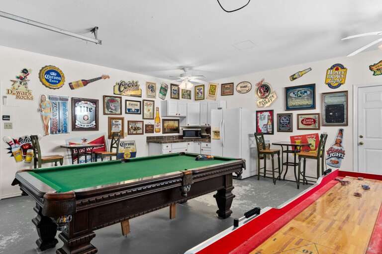 Vivid Vacation Rental Game Room With Varied Vintage Visuals And Vibrant Vibe